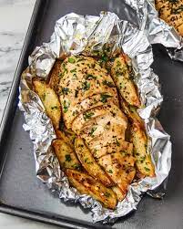 Upgrade Boneless Skinless Chicken Breasts With Garlic Butter And Potatoes Recipe Foil Packet Potatoes Butter Chicken Garlic Butter Chicken