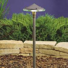 Another clever lighting idea is to purchase lights that look like garden stones and scatter the lights among the natural stones for a subtle effect. Can Landscape Lighting Fixtures Be Design Elements In Your Austin Area Landscape Nightscenes Landscape Lighting