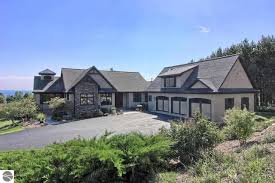 Luxury Homes For Sale In Suttons Bay Michigan Northern Michigan And Traverse City Real Estate Luxury Homes Brick House Plans House Plans