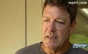 Woman walks dog without leash