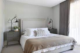 The curtains lower the general light level and provide privacy by preventing people outside from seeing directly into the room. Ceiling Mounted Curtain Tracks Open Up Possibilities