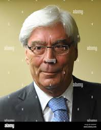 Witness and former CEO of the Bavarian bank BayernLB, Werner Schmidt,  arrives for his hearing in the trial against a former head of risk  management at Bavarian bank BayernLB at the Munich