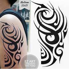Gambar tato salib keren di punggung sumber : Menakjubkan 12 Gambar Tato Tribal Modif Contoh Gambar Tato