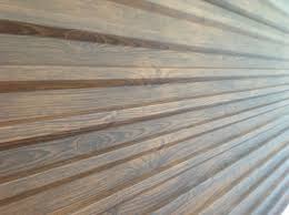 Metal Siding With Wood Grain Finish Steelogic Com Urbanscape Panels Exterior Wood Siding Panels Wood Siding Exterior Metal Siding