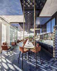 Studio ramoprimo based its design for the interior of this beijing bar on brick walls traditionally found. Blue Wave Bar Design El Equipo Creativo Archello