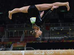 Simone arianne biles est née le 14 mars 1997 à columbus, dans l'ohio. Hernandez And Biles Win Silver Bronze As Netherlands Wevers Wins Balance Beam Gold The Torch Npr