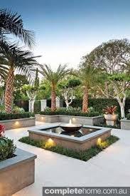 A Formal Water Feature In A Tropical Landscape Design From Franklin Landscape Design Tropical Pool Landscaping Landscaping Water Feature Tropical Landscaping