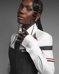 If you caught Doechii's performance at the Grammy Awards, chances are you  heard a big, bold voice in the background. That unmistakable voice was none  other than DJ Miss Milan. This month's