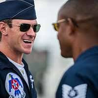 Elena, left, daughter of Lt. Col. Mark Henderson, 23d