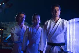 Tanner wears pants by dr. Exclusive Cobra Kai Star Tanner Buchanan Talks Season 2 Training Process And Being Part Of The Karate Kid Franchise Celebmix