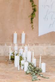 Minimalist Wedding Ideas For The Alternative Bride Groom White Candles Wedding Candle Wedding Centerpieces White Wedding Decorations