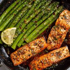 Season well with salt and pepper and roast the salmon for eight . Garlic Butter Salmon Recipe With Lemon Asparagus Healthy Salmon Recipe Eatwell101