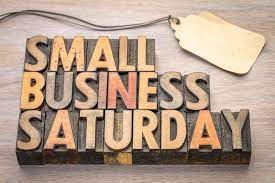 Small business owners smiling while holding sign for reopening of restaurant after. 284 Small Business Saturday Photos Free Royalty Free Stock Photos From Dreamstime