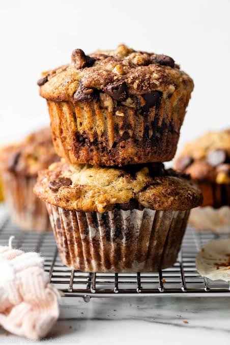 Quick & Easy Banana Muffins stacked on a plate