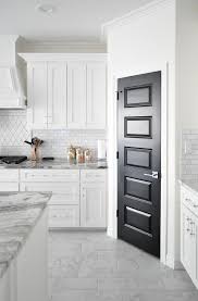 Living With Black Interior Doors 6 Month Update White Shaker Kitchen Kitchen Remodel Small White Shaker Cabinets