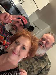 Watching TV with us.