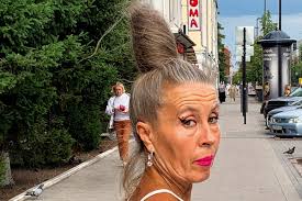 Rosie Marks' voyeuristic photos capture everyday life's banal absurdity