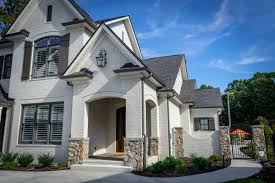 Please enter a valid zip code. Gorgeous White Brick Home With Dark Accents Love This Iron Gate Leading To The Back Yard And All Brick Exterior House White Exterior Houses White Brick Houses