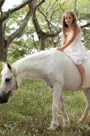 Young Girl Riding Bareback On Pony Stock Photo, Picture and Royalty Free  Image. Image 69305917.