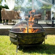 Round cast iron wood burning fire pit bowl in dark gray. 31 Outdoor Wood Burning Fire Pit Cauldron W Metal Grate Screen Poker Overstock 32522828