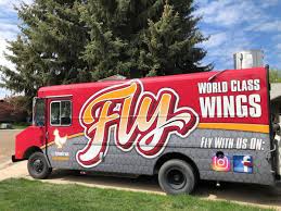 A food truck, mobile kitchen, mobile canteen, roach coach, gut truck, catering truck, or (in austin, texas) food trailer, is a mobile venue that transports and sells food. New Chicken Wing Food Truck Opens In Nampa Local News Idahopress Com