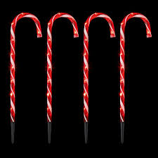 Variety of candy cane candies. Premier Red White Candy Cane Path Lights 62cm Pack Of 4 Outdoor Illuminated Figures Webbs Garden Centre