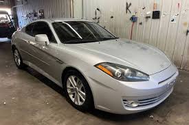 Image result for Bright Silver 2000 Tiburon