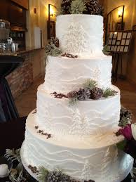 White Frosted Cake With Mountains And Pine Trees Perfect For An Outdoor Colorado Wedding Christmas Wedding Cakes Winter Wedding Cake Wedding Cake Tree