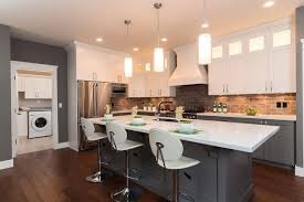 Keeping Cabinet Color On The Down Low Grey Kitchen Designs Brick Wall Kitchen White Kitchen Design