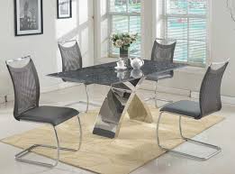Use of granite dining table is also a better than marble. Ingrid Granite Dining Table By Chintaly