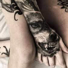 Black And Grey Hand Tattoos For Men Fantastic Black And Grey Realism Wolf Tattoo On Hand By Finn Laudwein Hand Tattoos For Guys Hand Tattoos Tattoos For Guys