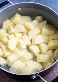 After all the potatoes have been sliced, drain in a colander set in the sink and rinse briefly under cool water. Easy Yukon Gold Mashed Potatoes Wonkywonderful