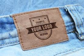 Add Your Own Logo Image Or Text Onto A Classic Brown Label On Blue Jeans A Closeup View Of A Jeans Label Sign A Creative Way Fo Logo Mockup Logos Jeans