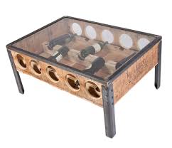 By painting a wine bottle white you emphasize its shape and you give a very interesting look. City Series Wine Rack Coffee Table Michael Graham Designs