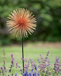 Solar flower garden stakes are also pretty popular as garden gifts and yard decorations. Allium Sunburst Stake Large Metal Flowers Garden Metal Flowers Allium Flowers