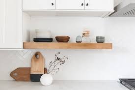 Open kitchen shelving is cheaper than cabinetry and the installation cost is also reduced in this case. Zmi60uhkhfmqrm