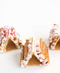 Then i made a pathway out of cinnamon hard candies my solution to the failed attempts at making a gingerbread house was to make pretzel log cabin instead. Mini Pretzel Log Graham Cracker Gingerbread House