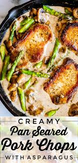 Creamy Pan Seared Pork Chops With Asparagus From The Food Charlatan Creamy Pan Seared Pork Chops Is Such An Easy Weekn In 2020 Pan Seared Pork Chops Food Pork Recipes