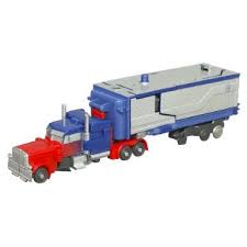 Amazon Com Transformers Dark Of The Moon Cyberverse Armored Optimus Prime Toys Games 16 Transformers Optimus Prime Transformers Toys