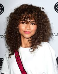 Since curly manes have a mind of their own, you want to leave this job to the hands of a stylist who has experience cutting and styling curly hair with bangs. Bangs For 3a Curly Hair Novocom Top