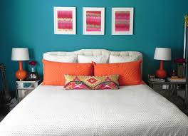 The colors themselves are bold, but the room itself needn't be that is why deep teal and cognac go so well together as a bedroom color scheme. Spray Paint Chardonnay Modern Bedroom Furniture Bedroom Orange Living Room Orange