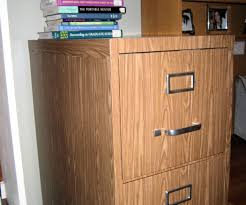 Diy filing cabinet makeover using vintage book pages #12monthsofdiy. File Cabinet Makeover How To Cover A File Cabinet With Contact Paper File Cabinet Makeover Filing Cabinet Diy File Cabinet