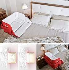 The Culla Belly Co Sleeper Attaches Onto Beds For Easy Access Designrulz Baby Cribs Baby Crib Mattress Baby Bed