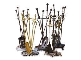 Black iron fire set with rustic heavy brass handle, modern powder coated surface, heavy duty, weighty, sturdy tools set. Which Fireplace Tools Do You Need
