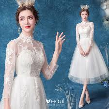 Check spelling or type a new query. Erschwinglich Ivory Creme Brautkleider Hochzeitskleider 2020 A Linie Stehkragen Perle Spitze Blumen 3 4 Armel Wadenlang