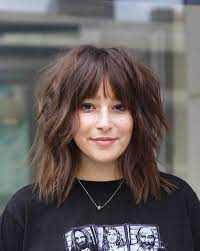 Medium cut for round faces. 50 Best Hairstyles With Bangs For 2021
