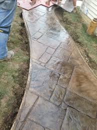 The fact that a concrete walkway is so much cheaper than alternative materials just makes economic sense. Pin By Fordson Concrete On Concreations Concrete Patio Makeover Concrete Patio Designs Concrete Walkway