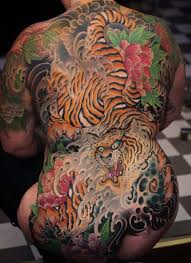 I wouldn't suggest getting a back tattoo as a first tattoo unless it's a small one, but obviously, it's up to you. Japanese Tiger Tattoos Meanings Tattoo Ideas More