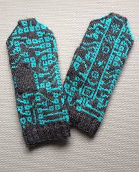 Many may avoid this knitting pattern for the cables look somewhat complicated, but you must try them. Knitting Pattern For Circuit Mittens Circuit Board Patterns Surround An Egyptian Style Cartouche Containi Fingerless Gloves Knitted Knitting Patterns Mittens