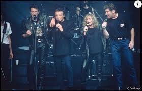 Michel sardou johnny hallyday l'envie. Johnny Hallyday Michel Sardou Veronique Sanson Et Eddy Mitchell Sur Scene Pour Un Concert Lors De La Tournee Des Enfoires Le 9 Novembre 1989 Purepeople